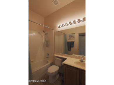 Popular Portland model home on the Fourth Hole of the Highlands on Heritage Highlands At Dove Mountain in Arizona - for sale on GolfHomes.com, golf home, golf lot