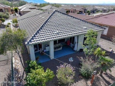 Popular Portland model home on the Fourth Hole of the Highlands on Heritage Highlands At Dove Mountain in Arizona - for sale on GolfHomes.com, golf home, golf lot