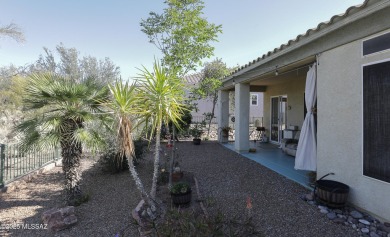 Popular Portland model home on the Fourth Hole of the Highlands on Heritage Highlands At Dove Mountain in Arizona - for sale on GolfHomes.com, golf home, golf lot