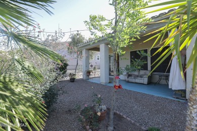 Popular Portland model home on the Fourth Hole of the Highlands on Heritage Highlands At Dove Mountain in Arizona - for sale on GolfHomes.com, golf home, golf lot