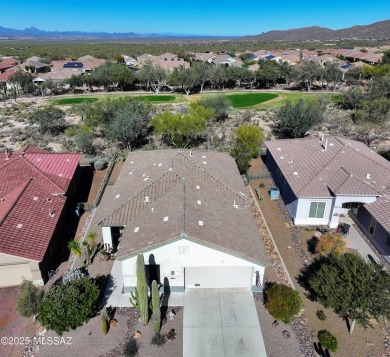 Popular Portland model home on the Fourth Hole of the Highlands on Heritage Highlands At Dove Mountain in Arizona - for sale on GolfHomes.com, golf home, golf lot