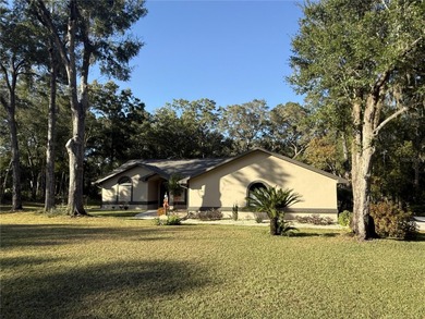 Completely updated ranch style pool home in Rainbow Springs on Rainbow Springs Golf and Country Club in Florida - for sale on GolfHomes.com, golf home, golf lot
