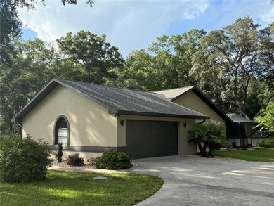 Completely updated ranch style pool home in Rainbow Springs on Rainbow Springs Golf and Country Club in Florida - for sale on GolfHomes.com, golf home, golf lot