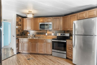 Welcome home to this 2 bed 1.5 bath beauty. Upgrades include on Barefoot Bay Golf Course in Florida - for sale on GolfHomes.com, golf home, golf lot