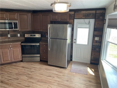 Welcome home to this 2 bed 1.5 bath beauty. Upgrades include on Barefoot Bay Golf Course in Florida - for sale on GolfHomes.com, golf home, golf lot