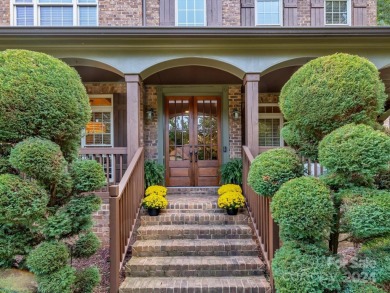 Welcome to this stunning home nestled in the prestigious Cowan on Cowans Ford Country Club in North Carolina - for sale on GolfHomes.com, golf home, golf lot