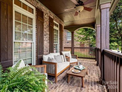 Welcome to this stunning home nestled in the prestigious Cowan on Cowans Ford Country Club in North Carolina - for sale on GolfHomes.com, golf home, golf lot