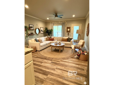 Super cute home perched at the end of a quiet and lovely cu de on Lake Forest Yacht and Country Club in Alabama - for sale on GolfHomes.com, golf home, golf lot