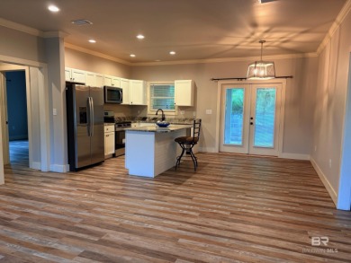 Super cute home perched at the end of a quiet and lovely cu de on Lake Forest Yacht and Country Club in Alabama - for sale on GolfHomes.com, golf home, golf lot