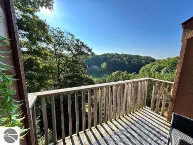This exceptional three-bedroom, three-and-a-half bathroom condo on Shanty Creek Golf Course in Michigan - for sale on GolfHomes.com, golf home, golf lot