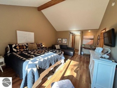 This exceptional three-bedroom, three-and-a-half bathroom condo on Shanty Creek Golf Course in Michigan - for sale on GolfHomes.com, golf home, golf lot