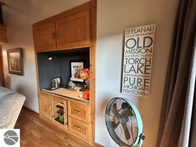 This exceptional three-bedroom, three-and-a-half bathroom condo on Shanty Creek Golf Course in Michigan - for sale on GolfHomes.com, golf home, golf lot