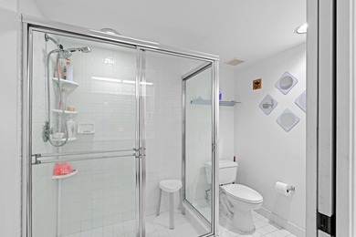 ABSOLUTELY GORGEOUS WATERFRONT 4TH FLOOR CONDO | PRESTIGIOUS 55+ on Fountains Golf and Country Club in Florida - for sale on GolfHomes.com, golf home, golf lot