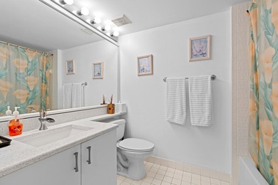 ABSOLUTELY GORGEOUS WATERFRONT 4TH FLOOR CONDO | PRESTIGIOUS 55+ on Fountains Golf and Country Club in Florida - for sale on GolfHomes.com, golf home, golf lot