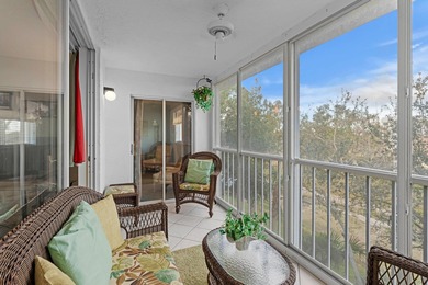 ABSOLUTELY GORGEOUS WATERFRONT 4TH FLOOR CONDO | PRESTIGIOUS 55+ on Fountains Golf and Country Club in Florida - for sale on GolfHomes.com, golf home, golf lot