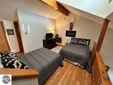 This exceptional three-bedroom, three-and-a-half bathroom condo on Shanty Creek Golf Course in Michigan - for sale on GolfHomes.com, golf home, golf lot