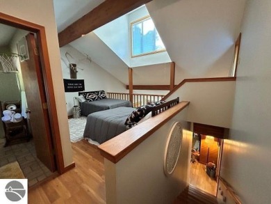 This exceptional three-bedroom, three-and-a-half bathroom condo on Shanty Creek Golf Course in Michigan - for sale on GolfHomes.com, golf home, golf lot