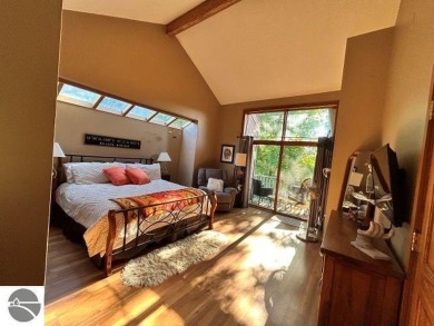 This exceptional three-bedroom, three-and-a-half bathroom condo on Shanty Creek Golf Course in Michigan - for sale on GolfHomes.com, golf home, golf lot