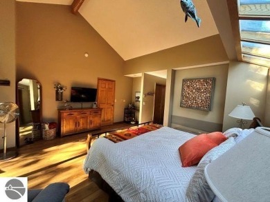 This exceptional three-bedroom, three-and-a-half bathroom condo on Shanty Creek Golf Course in Michigan - for sale on GolfHomes.com, golf home, golf lot