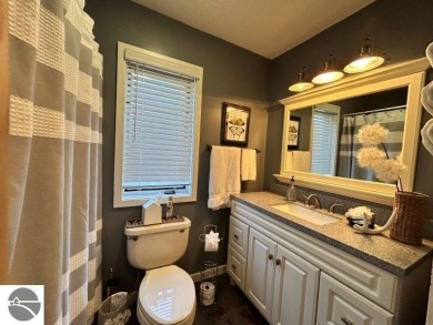 This exceptional three-bedroom, three-and-a-half bathroom condo on Shanty Creek Golf Course in Michigan - for sale on GolfHomes.com, golf home, golf lot