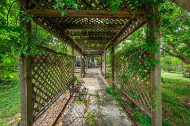 This three bedroom, two and one half bathroom home is nestled in on Riverhill Country Club in Texas - for sale on GolfHomes.com, golf home, golf lot