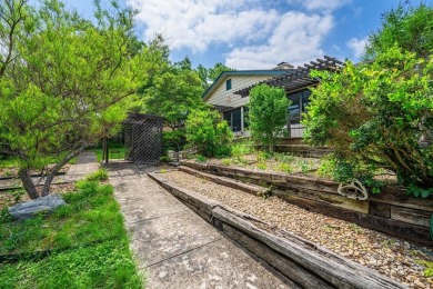 This three bedroom, two and one half bathroom home is nestled in on Riverhill Country Club in Texas - for sale on GolfHomes.com, golf home, golf lot