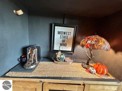 This exceptional three-bedroom, three-and-a-half bathroom condo on Shanty Creek Golf Course in Michigan - for sale on GolfHomes.com, golf home, golf lot