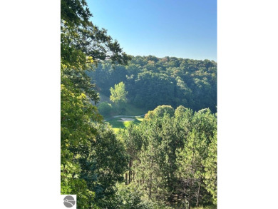 This exceptional three-bedroom, three-and-a-half bathroom condo on Shanty Creek Golf Course in Michigan - for sale on GolfHomes.com, golf home, golf lot