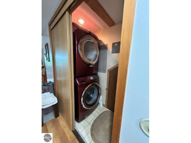 This exceptional three-bedroom, three-and-a-half bathroom condo on Shanty Creek Golf Course in Michigan - for sale on GolfHomes.com, golf home, golf lot