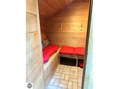 This exceptional three-bedroom, three-and-a-half bathroom condo on Shanty Creek Golf Course in Michigan - for sale on GolfHomes.com, golf home, golf lot