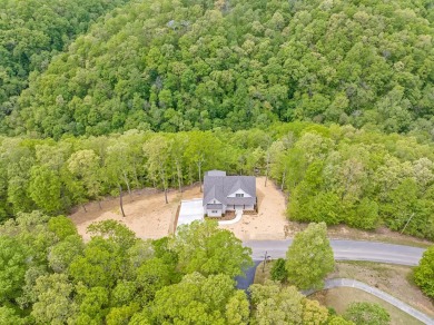 This  beautiful home faces the lake and has a gorgeous golf on Riverwatch Golf Club in Tennessee - for sale on GolfHomes.com, golf home, golf lot