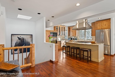 Tucked away off of Cemetery Lane, this cozy home backs up to the on Aspen Golf Club in Colorado - for sale on GolfHomes.com, golf home, golf lot