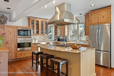 Tucked away off of Cemetery Lane, this cozy home backs up to the on Aspen Golf Club in Colorado - for sale on GolfHomes.com, golf home, golf lot