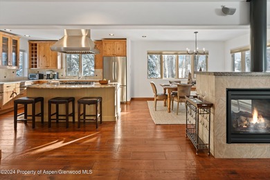 Tucked away off of Cemetery Lane, this cozy home backs up to the on Aspen Golf Club in Colorado - for sale on GolfHomes.com, golf home, golf lot