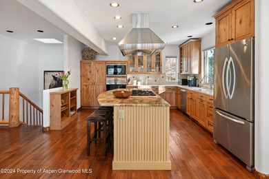 Tucked away off of Cemetery Lane, this cozy home backs up to the on Aspen Golf Club in Colorado - for sale on GolfHomes.com, golf home, golf lot