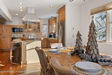 Tucked away off of Cemetery Lane, this cozy home backs up to the on Aspen Golf Club in Colorado - for sale on GolfHomes.com, golf home, golf lot