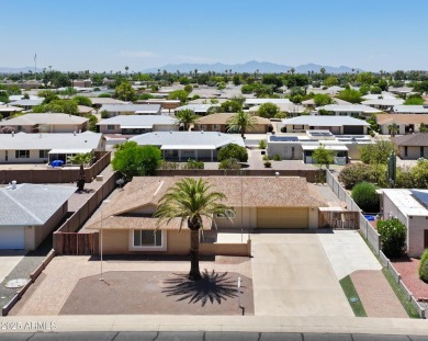Welcome to this beautifully maintained Highland model home in on Sun City Lakes West and East in Arizona - for sale on GolfHomes.com, golf home, golf lot