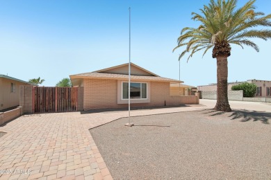 Welcome to this beautifully maintained Highland model home in on Sun City Lakes West and East in Arizona - for sale on GolfHomes.com, golf home, golf lot