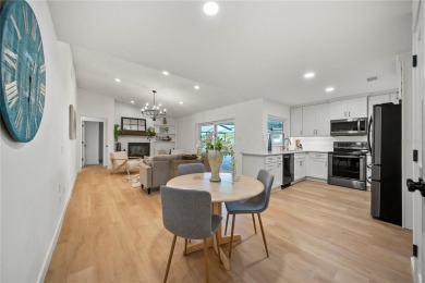 Experience waterfront luxury living in this fully renovated on Bloomingdale Golfers Club in Florida - for sale on GolfHomes.com, golf home, golf lot