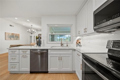 Experience waterfront luxury living in this fully renovated on Bloomingdale Golfers Club in Florida - for sale on GolfHomes.com, golf home, golf lot