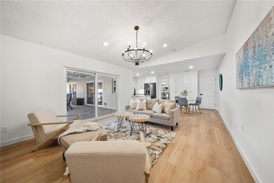 Experience waterfront luxury living in this fully renovated on Bloomingdale Golfers Club in Florida - for sale on GolfHomes.com, golf home, golf lot