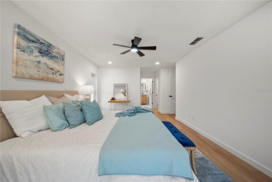 Experience waterfront luxury living in this fully renovated on Bloomingdale Golfers Club in Florida - for sale on GolfHomes.com, golf home, golf lot