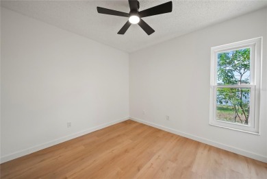 Experience waterfront luxury living in this fully renovated on Bloomingdale Golfers Club in Florida - for sale on GolfHomes.com, golf home, golf lot