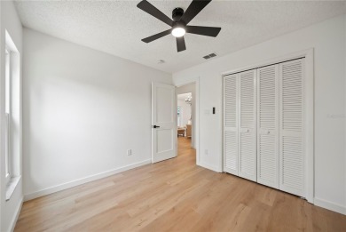 Experience waterfront luxury living in this fully renovated on Bloomingdale Golfers Club in Florida - for sale on GolfHomes.com, golf home, golf lot