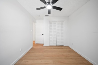 Experience waterfront luxury living in this fully renovated on Bloomingdale Golfers Club in Florida - for sale on GolfHomes.com, golf home, golf lot