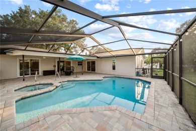 Experience waterfront luxury living in this fully renovated on Bloomingdale Golfers Club in Florida - for sale on GolfHomes.com, golf home, golf lot