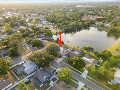 Experience waterfront luxury living in this fully renovated on Bloomingdale Golfers Club in Florida - for sale on GolfHomes.com, golf home, golf lot