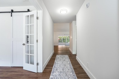 JUST RENOVATED! New Bathrooms, flooring, drywall, new electrical on Seagate Country Club in Florida - for sale on GolfHomes.com, golf home, golf lot