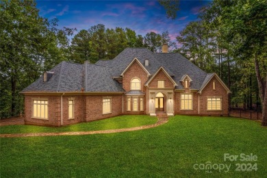 Stately all brick home w/breathtaking golf course views on Trump National Golf Club Charlotte in North Carolina - for sale on GolfHomes.com, golf home, golf lot