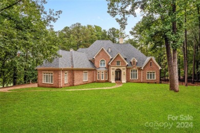 Stately all brick home w/breathtaking golf course views on Trump National Golf Club Charlotte in North Carolina - for sale on GolfHomes.com, golf home, golf lot